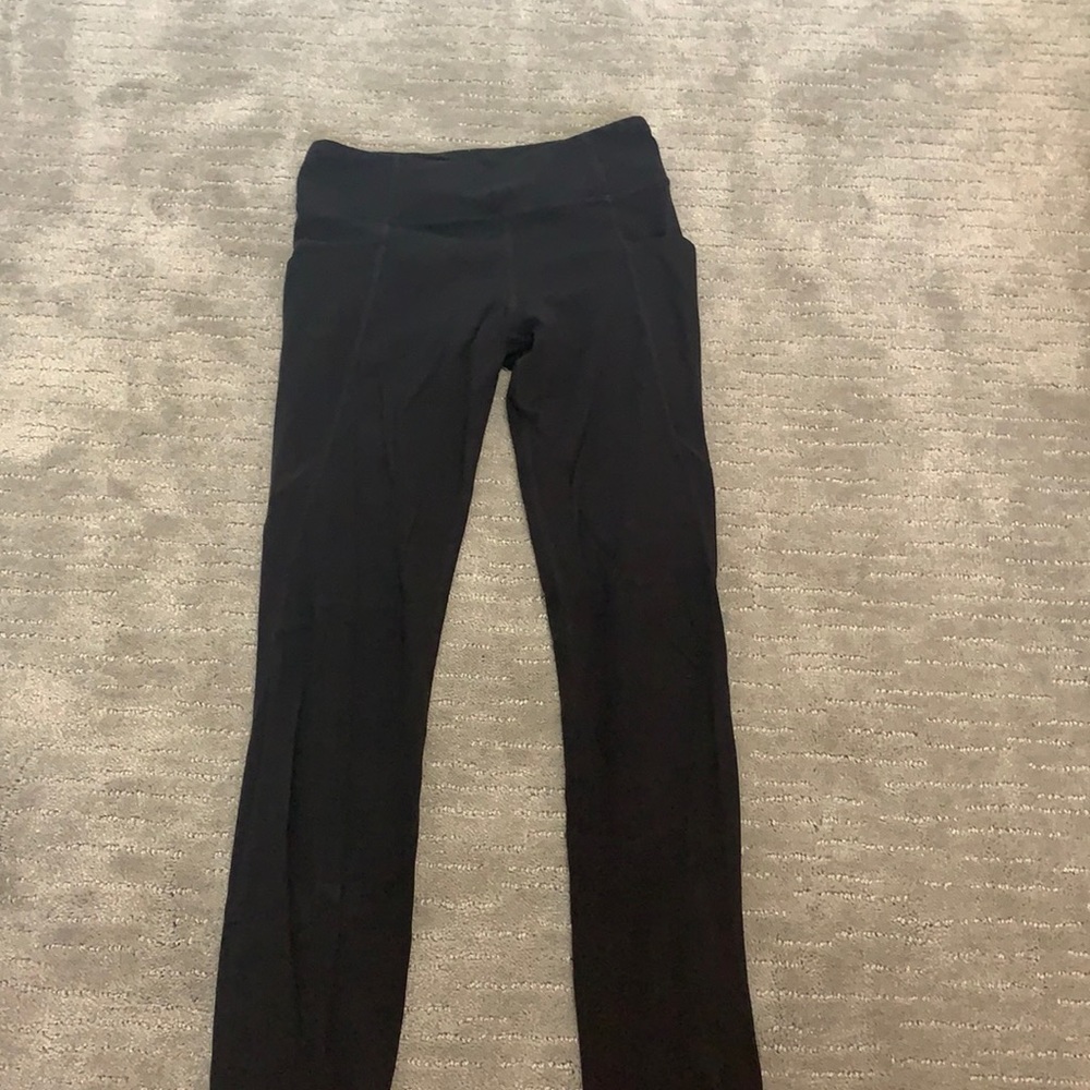 black athleta girl leggings with side pockets